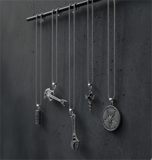 PARADOX COLLECTIVE High Stakes 5-Piece Collector's Pendant Set – WRENCH, SKULL ROCKING GUITAR, ZEN-CYLINDER, SWORD OF ANGLE, & GOAT STAR Necklaces on 24 Inch Stainless Steel Chain for Mens and Boys — Necklace for Men | THE MEN THING