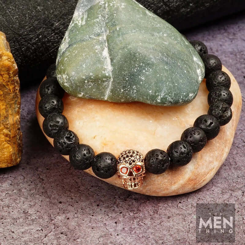 THE MEN THING Bead Bracelet INTERNO SKULL - Natural Beads Bracelet - Rose Gold Toned Skull with Red Stone in Eyes (7inch)