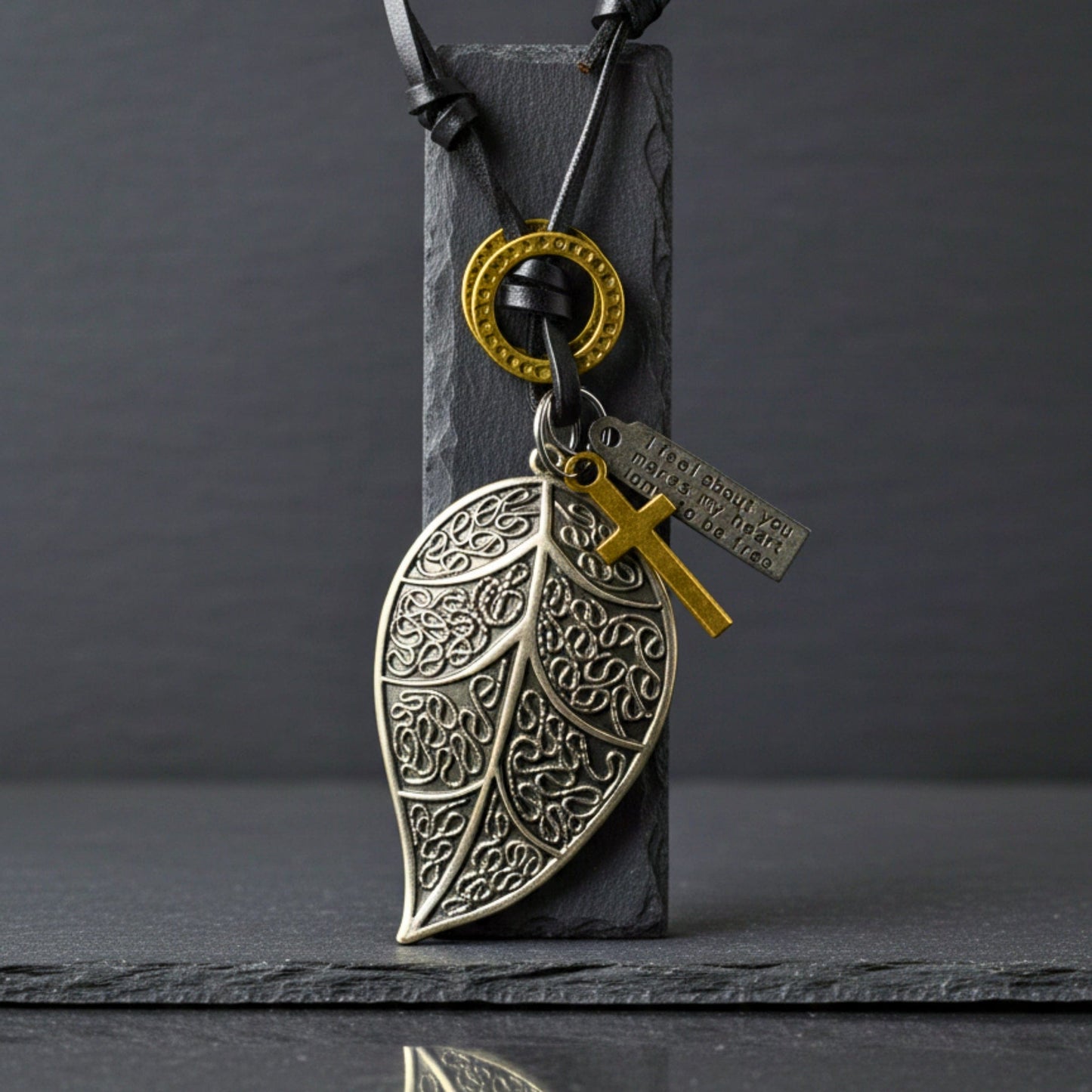 THE MEN THING Leather Necklace ETHEREAL LEAF – 2.5-Inch Pure Stainless Steel Pendant with Adjustable Leather Rope for Men & Boys