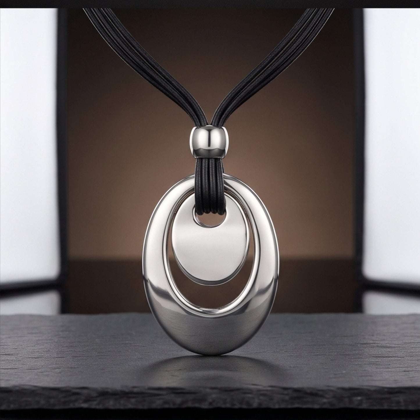 THE MEN THING Leather Necklace NESTED OVAL DROP - 35mm Titanium Steel Pendant with Adjustable Leather Rope Necklace for Men & Boys (20 to 23 inch)