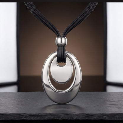 THE MEN THING Leather Necklace NESTED OVAL DROP - 35mm Titanium Steel Pendant with Adjustable Leather Rope Necklace for Men & Boys (20 to 23 inch)