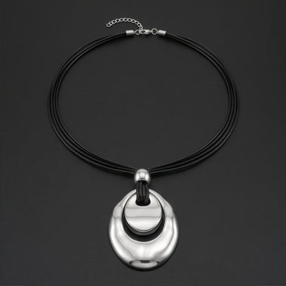THE MEN THING Leather Necklace NESTED OVAL DROP - 35mm Titanium Steel Pendant with Adjustable Leather Rope Necklace for Men & Boys (20 to 23 inch)