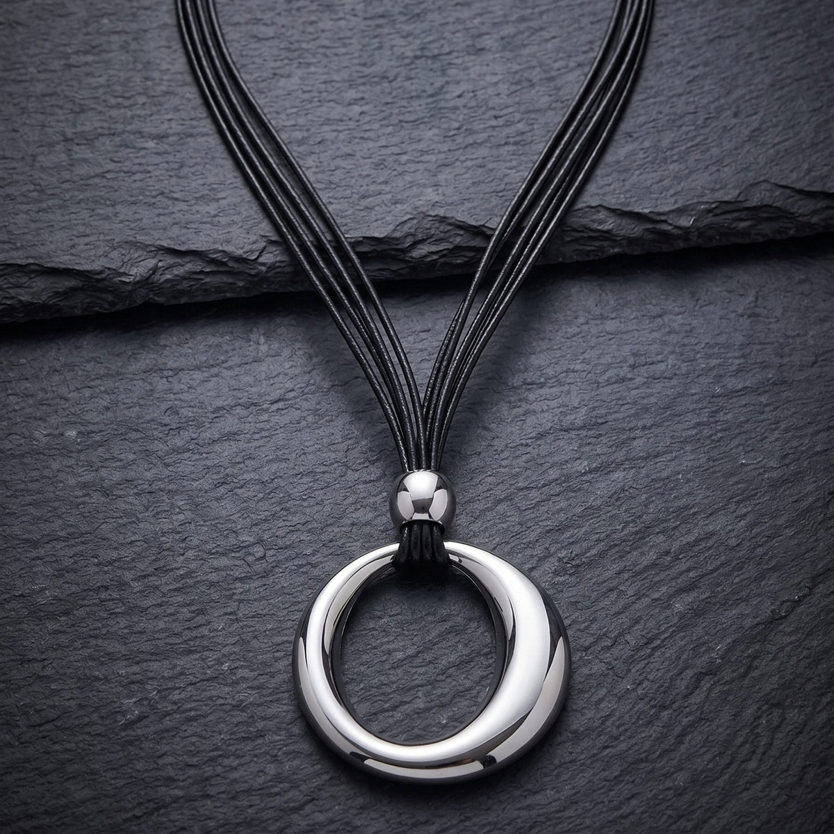 THE MEN THING Leather Necklace NESTED OVAL DROP - 43mm Titanium Steel Pendant with Leather Rope Necklace for Men & Boys (19 inch)
