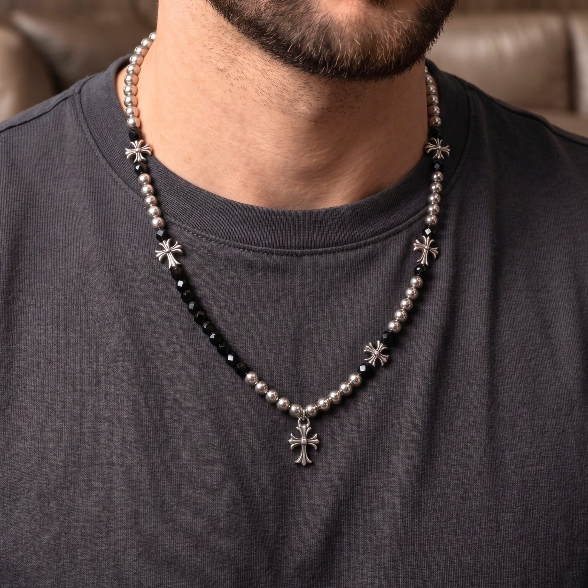 Stylish titanium steel cross necklace for men featuring pearl accents and adjustable design.
