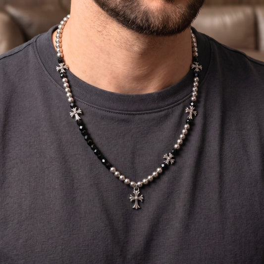 Stylish titanium steel cross necklace for men featuring pearl accents and adjustable design.