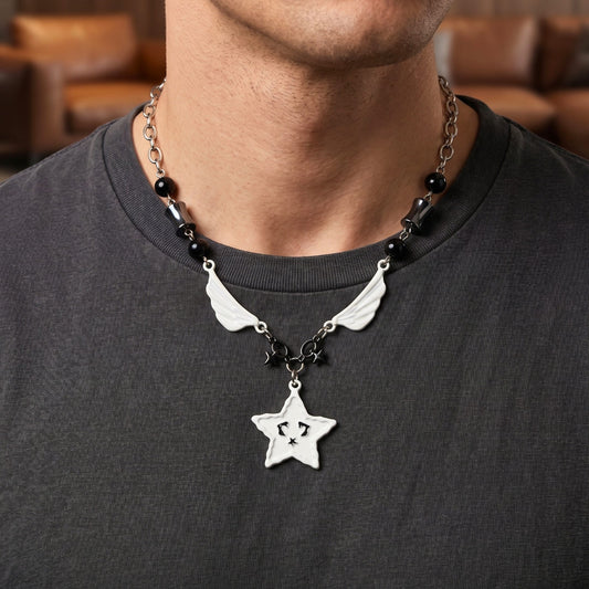 titanium steel star pendant necklace worn by a man, featuring wings and a textured cable chain.