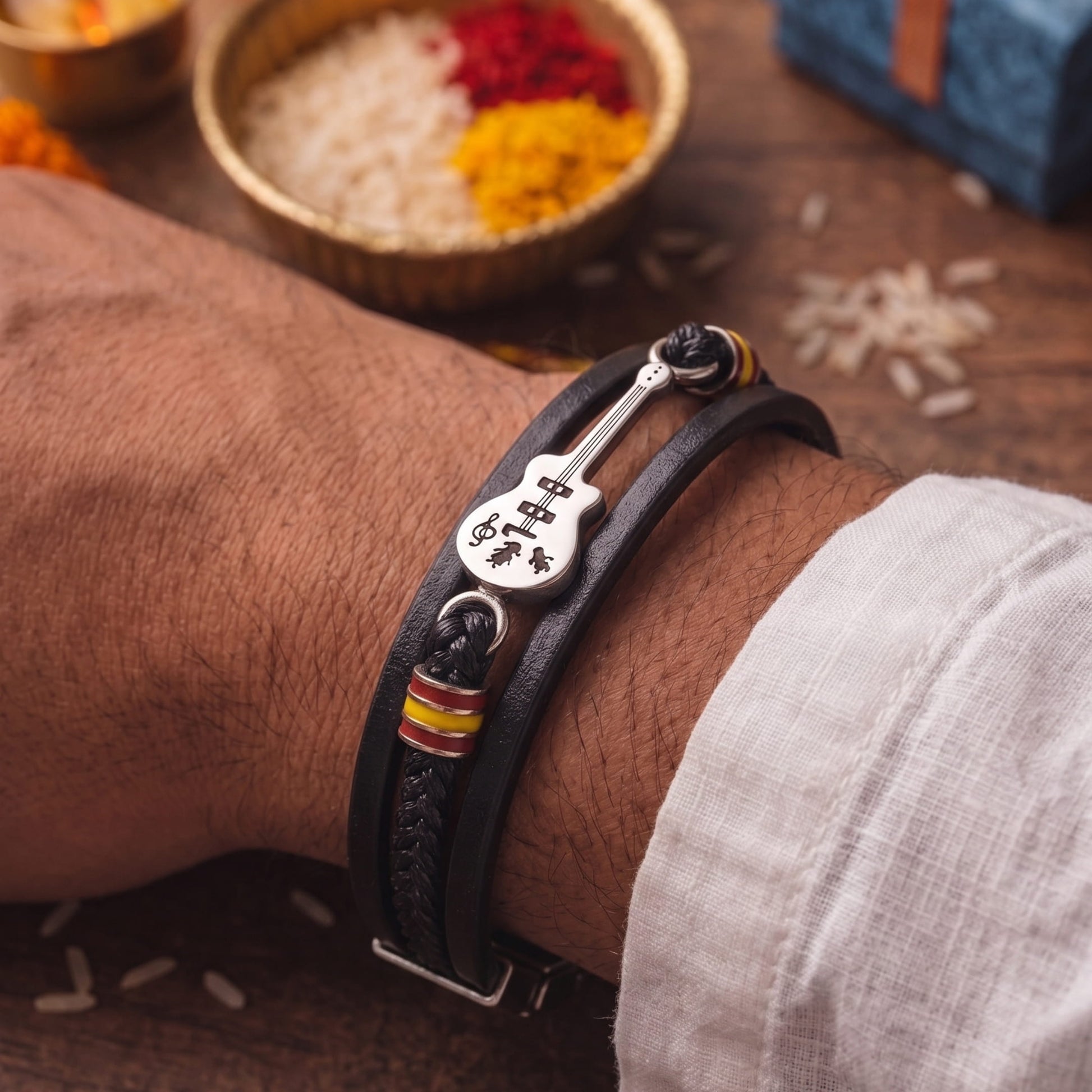 THE MEN THING The Perfect Rakhi Gift For Every Brother – GUITAR CHARM BLACK - Three Strand Genuine Leather Bracelet with Stainless Steel Magnetic Buckle for Men & Boy (8 inch)