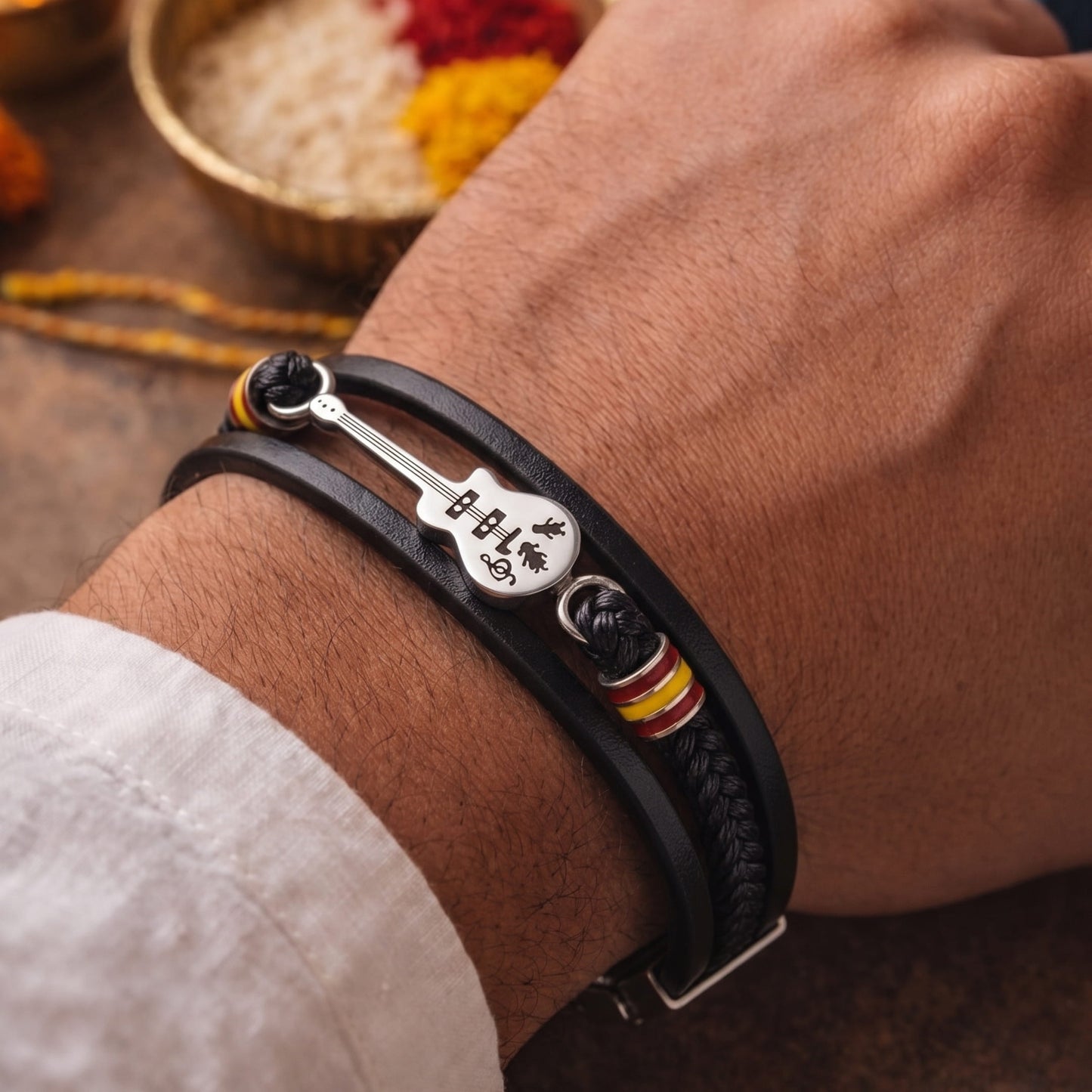 THE MEN THING The Perfect Rakhi Gift For Every Brother – GUITAR CHARM BLACK - Three Strand Genuine Leather Bracelet with Stainless Steel Magnetic Buckle for Men & Boy (8 inch)
